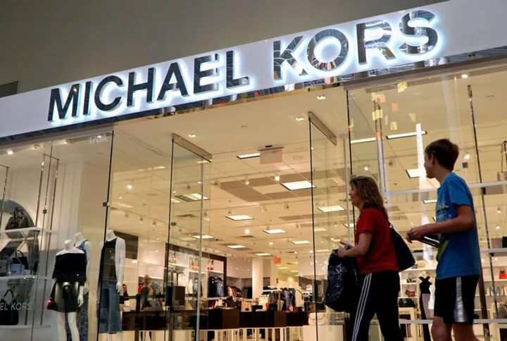 Coach owner's Michael Kors deal creates US giant to take on European luxury rivals